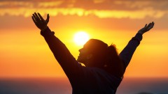 Woman Praising And Enjoying Golden Sunset