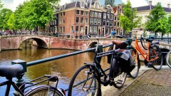 bike-alongside-the-canals-of-amsterdam-netherlands
