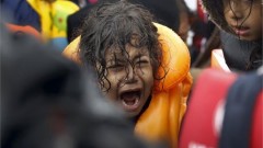 23942659_2015_12_10T080507Z_1690583625_GF20000080758_RTRMADP_3_MIGRANTS_YEAR_ENDER_2015_limghandler