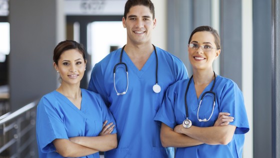 young hospital workers in scrubs