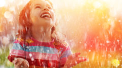 kid-happy-in-rain